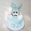 Custom cake decorated with a cute pastel bunny design
