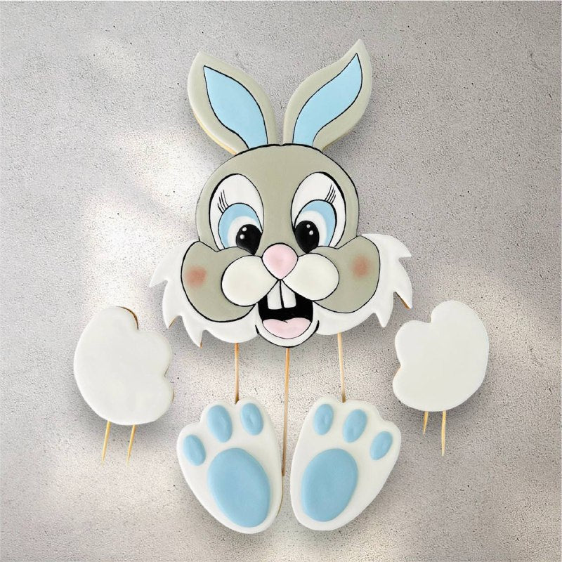 Hand-decorated bunny-shaped sugar cookie with pastel icing