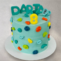Custom cake decorated with a mountain climbing scene design