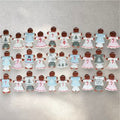 Decorated gingerbread family cookies lined up together