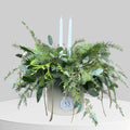 Evergreen and flower Christmas centerpiece arrangement for a table display