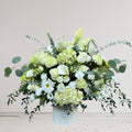All-white flower vase arrangement with garden roses and greenery