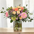 Muted-tone seasonal flower arrangement in a vase