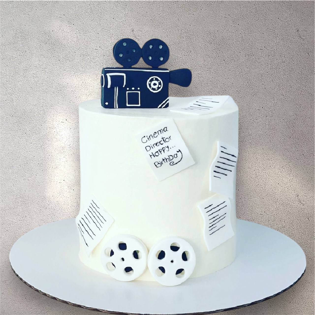 Custom cake designed to look like a vintage camera lens