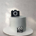 Custom celebration cake with decorative piping and personalized design