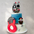 Pirate ship themed custom cake with ocean wave buttercream details