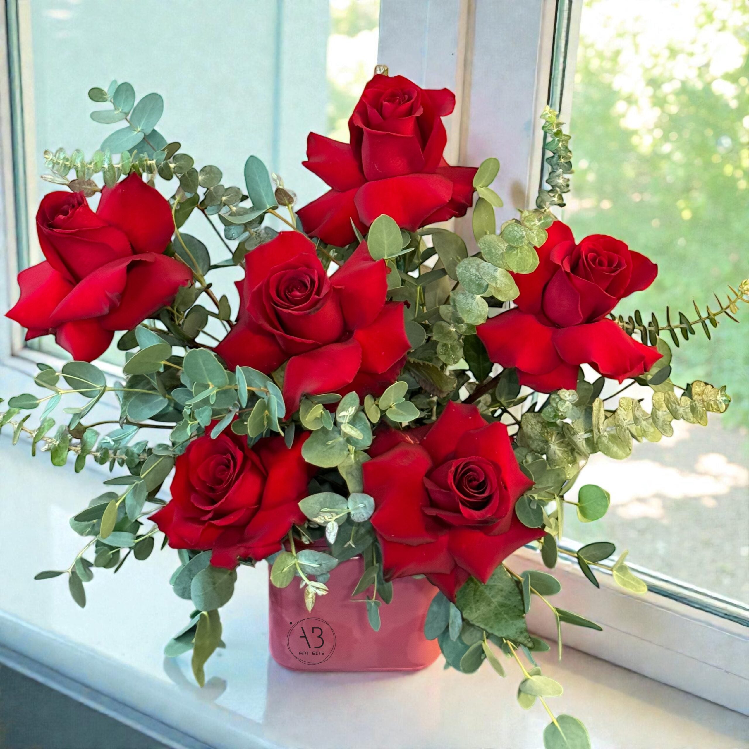 Close-up of cube vase floral arrangement with soft texture