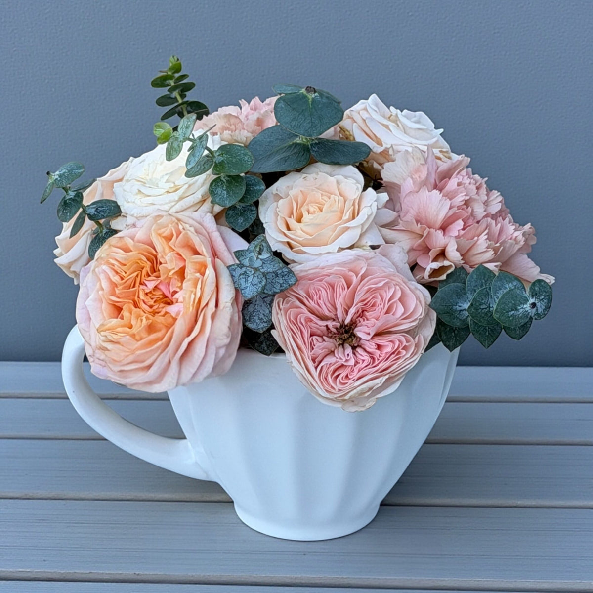 Designer's-choice vase arrangement with mixed seasonal flowers