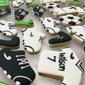 Soccer-themed decorated cookies arranged in a gift box