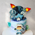 Rocket-shaped custom birthday cake with space and starship details