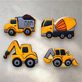 Hand-decorated truck-shaped sugar cookies in bright colors